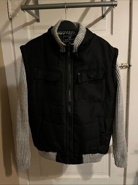 Nick Danger Black Puffer Vest with Gray Knit Sleeves